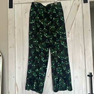 Anthropologie Elevenses silky Navy floral pants. Size 10 Wide leg. Pockets